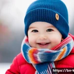 Home 21 유아용 스카프 활용법 - A cute toddler wearing a soft cotton scarf loosely wrapped around the neck for warmth, dressed in co...